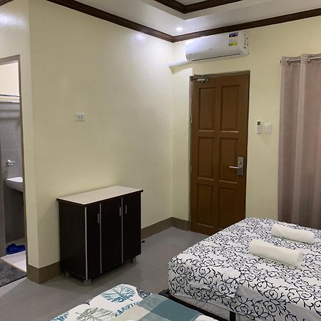 Zl Travelers Inn Batuan Exterior foto