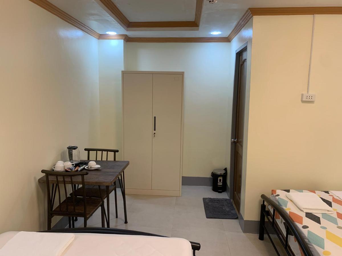 Zl Travelers Inn Batuan Exterior foto