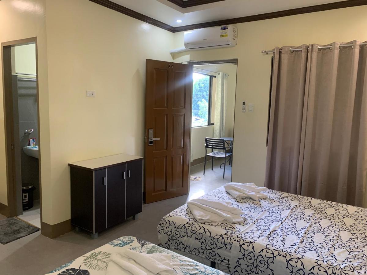 Zl Travelers Inn Batuan Exterior foto