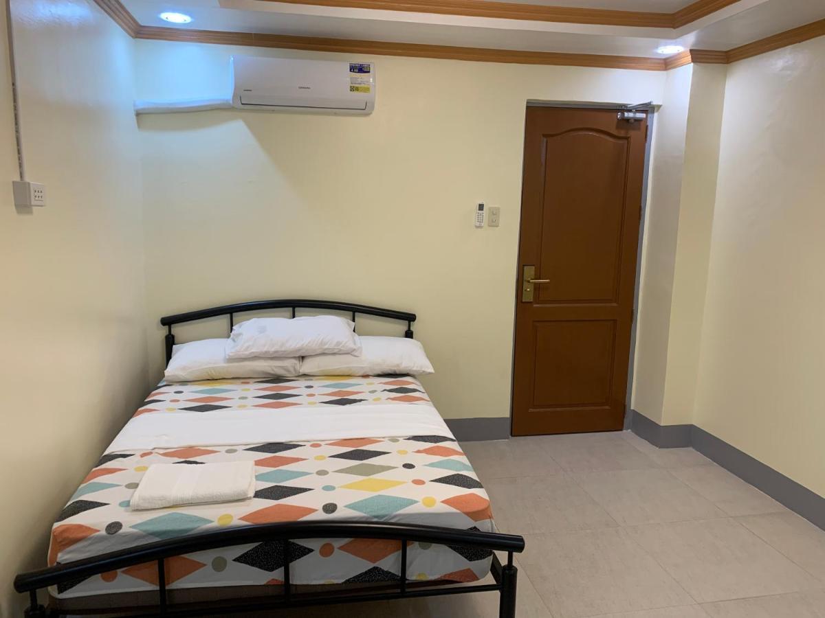 Zl Travelers Inn Batuan Exterior foto