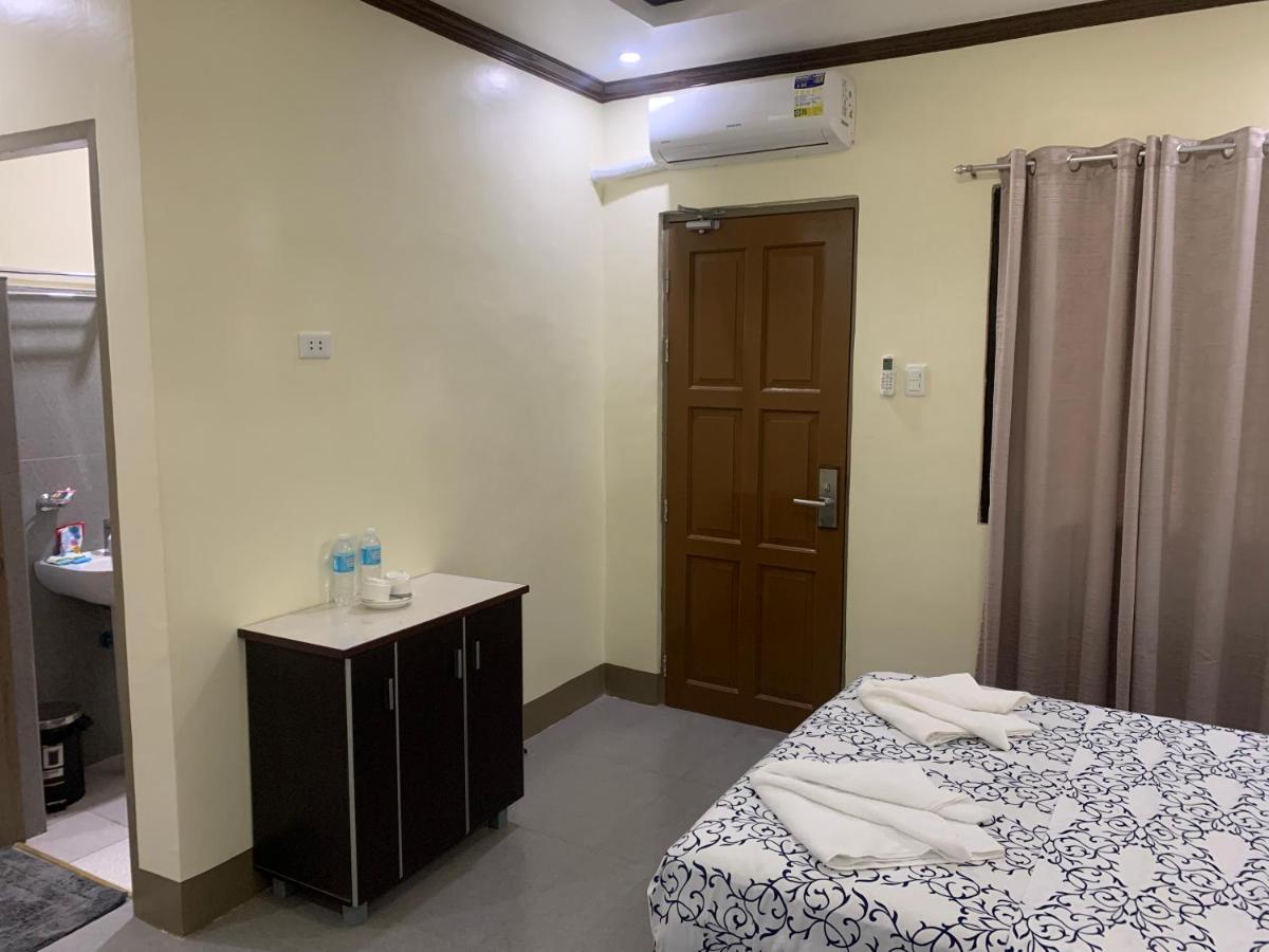 Zl Travelers Inn Batuan Exterior foto