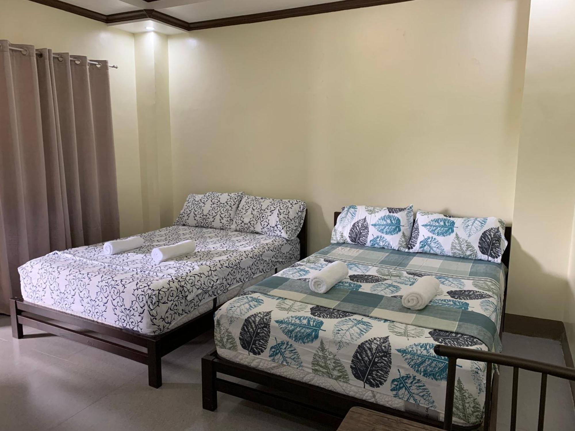 Zl Travelers Inn Batuan Exterior foto