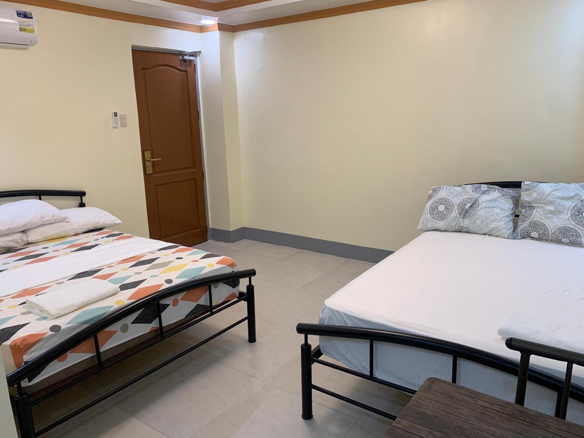 Zl Travelers Inn Batuan Exterior foto