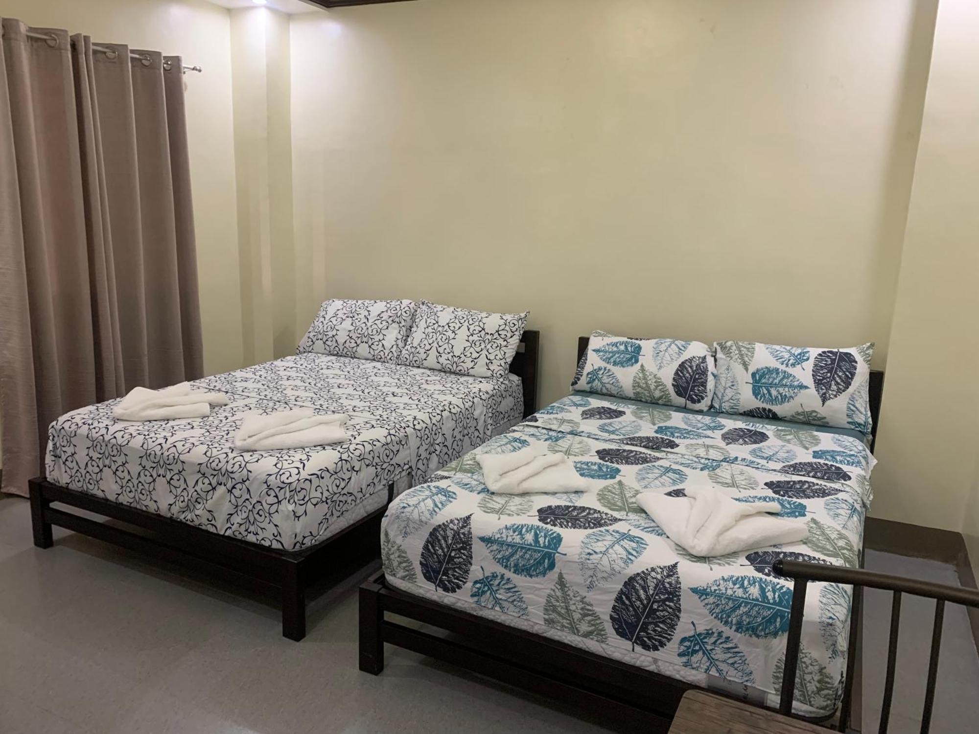 Zl Travelers Inn Batuan Exterior foto